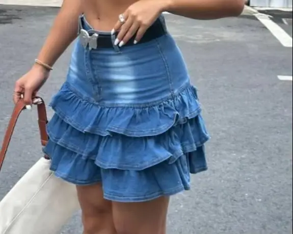 Saia para mulher 2026 nova primavera cor sólida picante menina cintura alta streetwear moda babados em camadas a linha denim mini saia