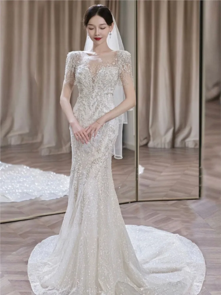 Nowa sukienka szyfonowa na jedno ramię, bardzo ciężka, w stylu lekkiego luksusu z trenem typu rybka.