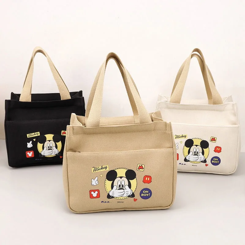 Nueva bolsa de almuerzo de mano portátil de alto valor con estampado de dibujos animados con personalidad creativa periférica de anime de Mickey Mouse de Disney
