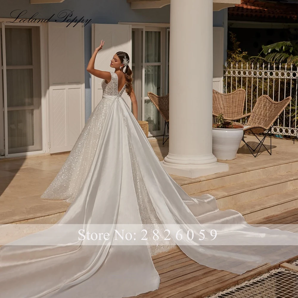 Lceland Poppy Customized V Neck Ball Gown Lace Wedding Dresses Sleeveless Beaded Backless Bridal Gowns with Chapel Train