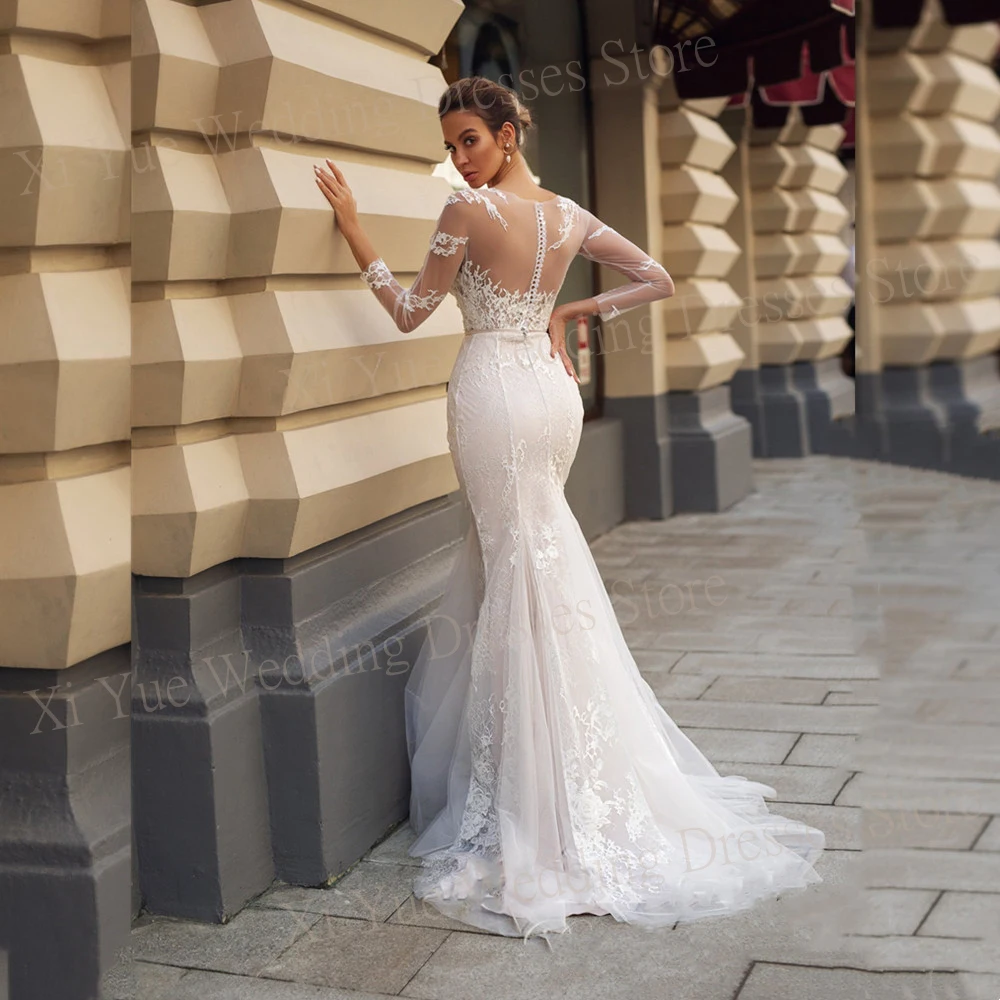 Modesto Sexy sirena abiti da sposa squisiti Tulle pizzo Applique bottone indietro abiti da sposa manica lunga Illusion Vestido De Novia