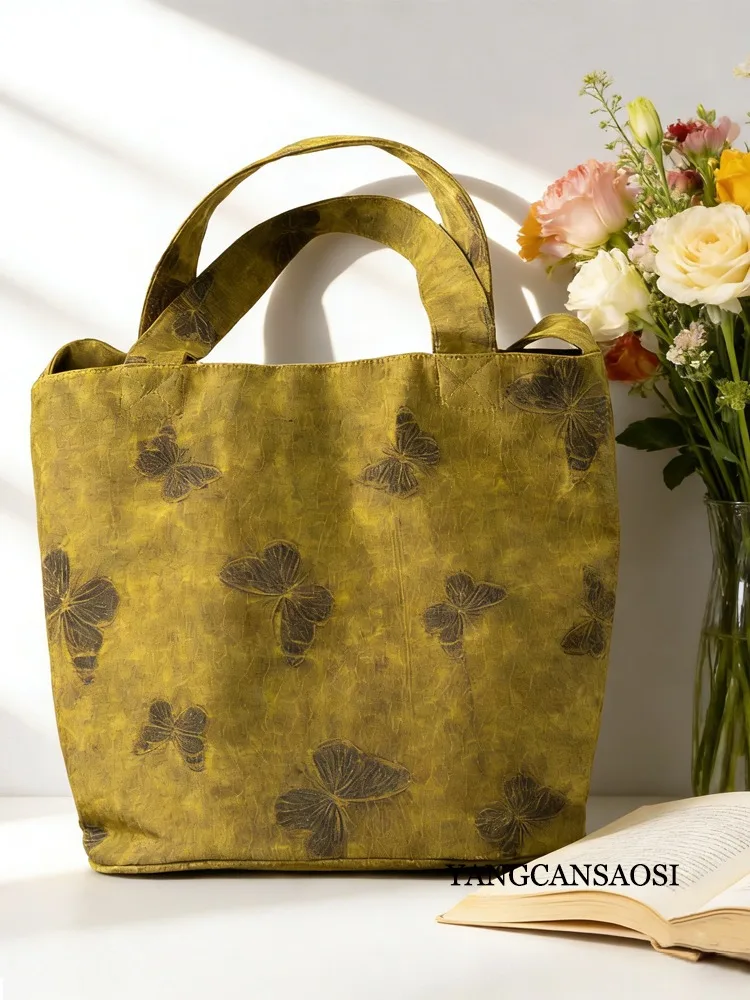 Borsa a secchiello in filato di nuvola profumata retrò cinese dal design di nicchia Nuova borsa da donna versatile di grande capacità di fascia alta