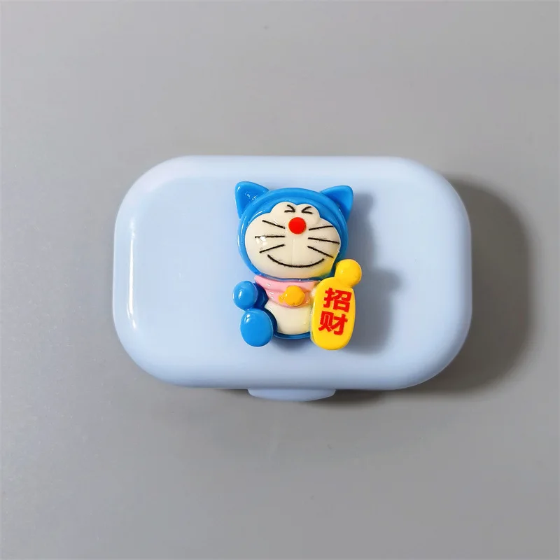 Doraemon Robot Cat Contact Lens, banc de boîte d'acceptation, dessin animé, bref, portable, compact, chanceux, richesse, article mignon, nouveau, 2024