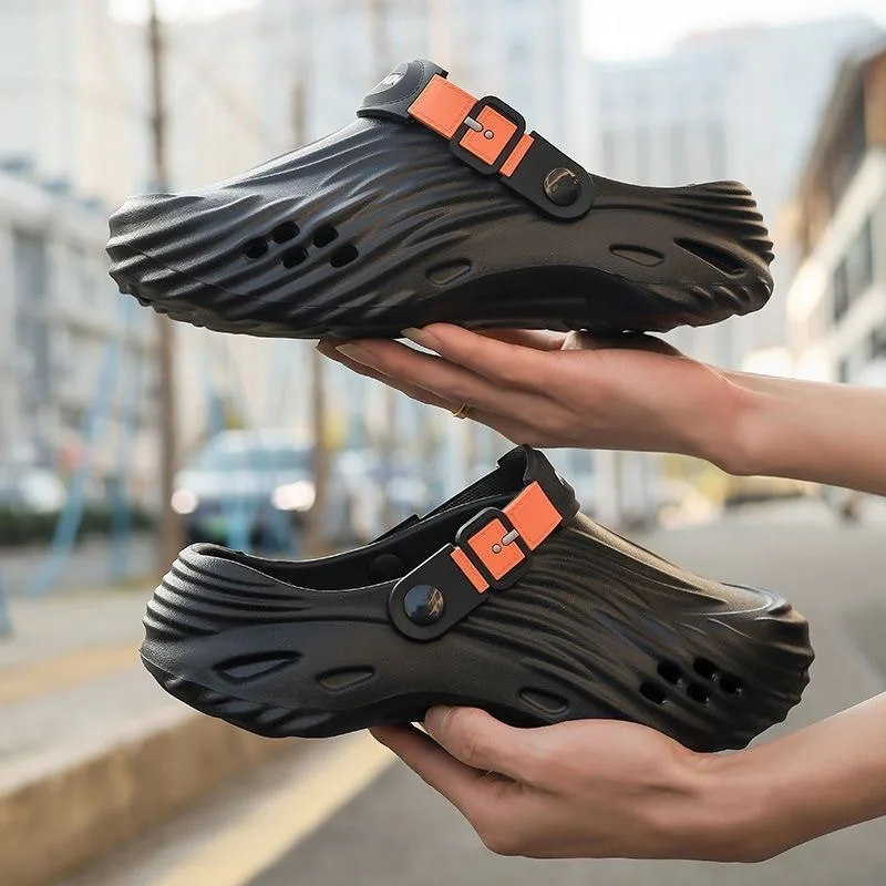 

Black trend hole shoes men's outdoor creek shoes wear beach shoes one-word slippers men's bag head drag casual sandals