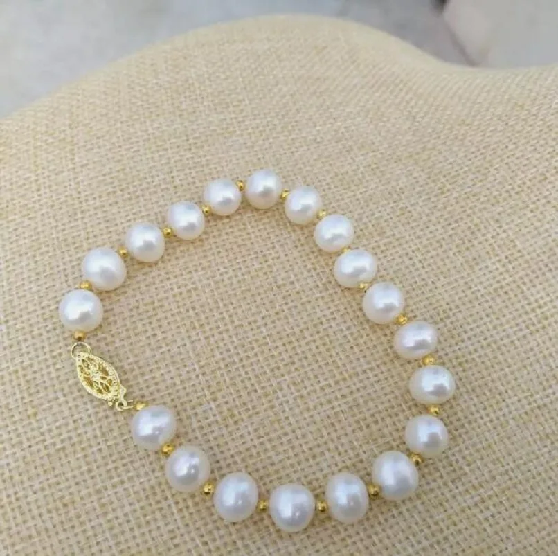 Bestselling 7.5-8 inch natural AAAA South Sea white pearl 9-10mm bracelet in 14kCustomized Jewelry