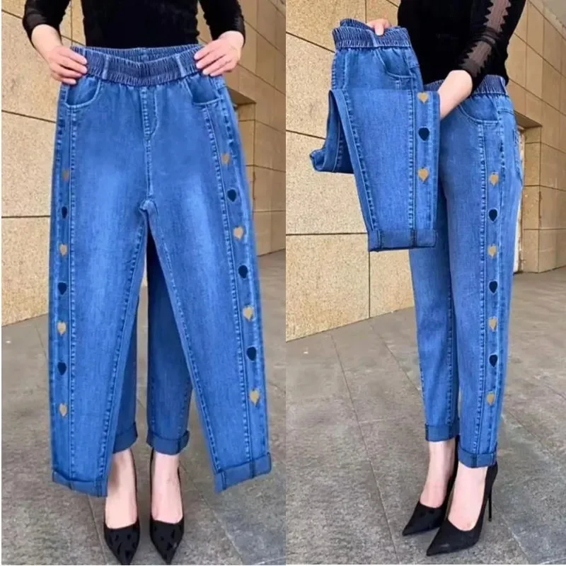 Dżinsy zimowe z haftem damskie elastyczne dżinsy z wysokim stanem 5XL modne damskie czarne niebieskie dżinsy typu mom z kieszeniami obcisłe elastyczne spodnie damskie