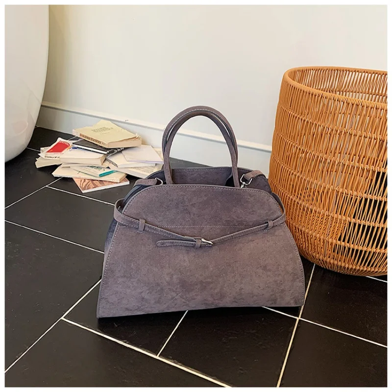 structured-dome-shaped-handbag-with-top-handle-belt-detail-multi-way-carry-design-for-everyday-use