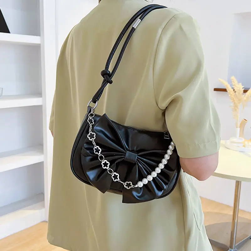 Bolso de hombro con perlas para mujer, bolsa con cadena y lazo de cuero PU, textura coreana, elegante