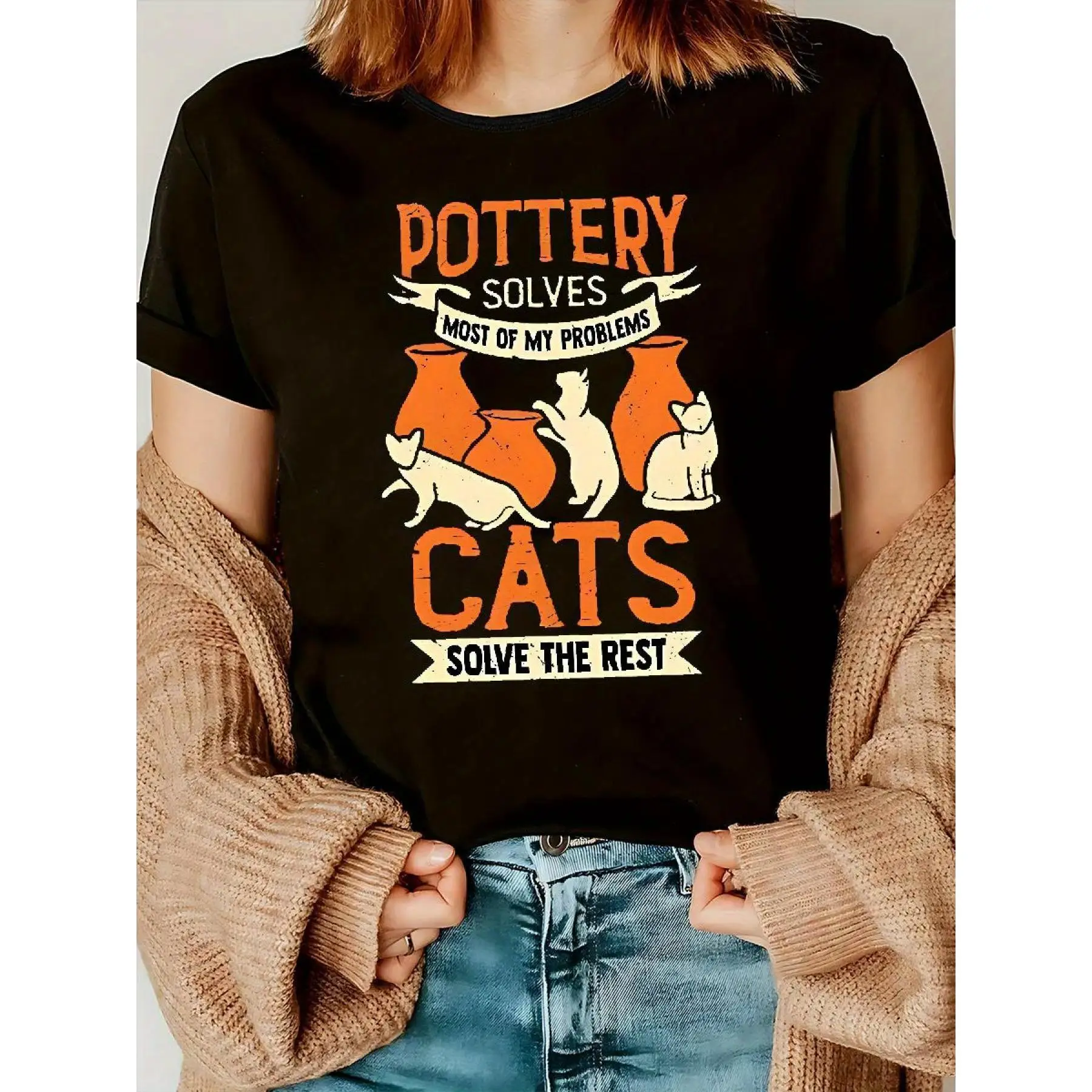 

Women's Casual Cat Lover T-Shirt - Black Short Sleeve Round Neck With "Pottery Solves Most Of My Problems" Humorous Print & Oran