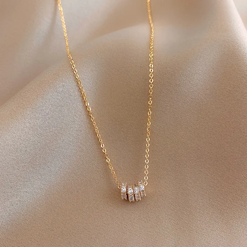 

Korean Version of Fashion Commuter Women's Necklace Pendant Jewelry Copper-plated Real Gold Four-round Ring Micro-inlaid Jewelry