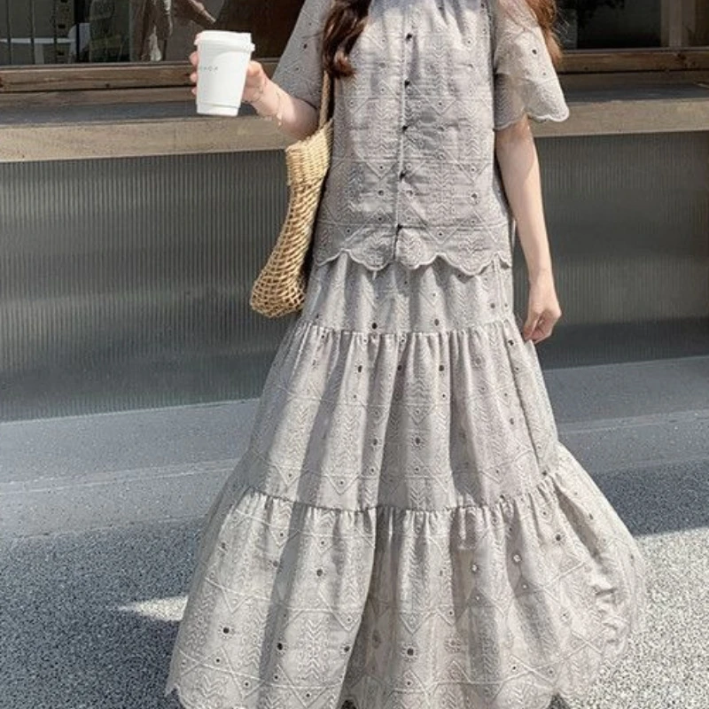 Temperament Set Skirt Summer New Fashionable Half Skirt Two-piece Set Hollowed Out Short Sleeved Top To Cover The Flesh