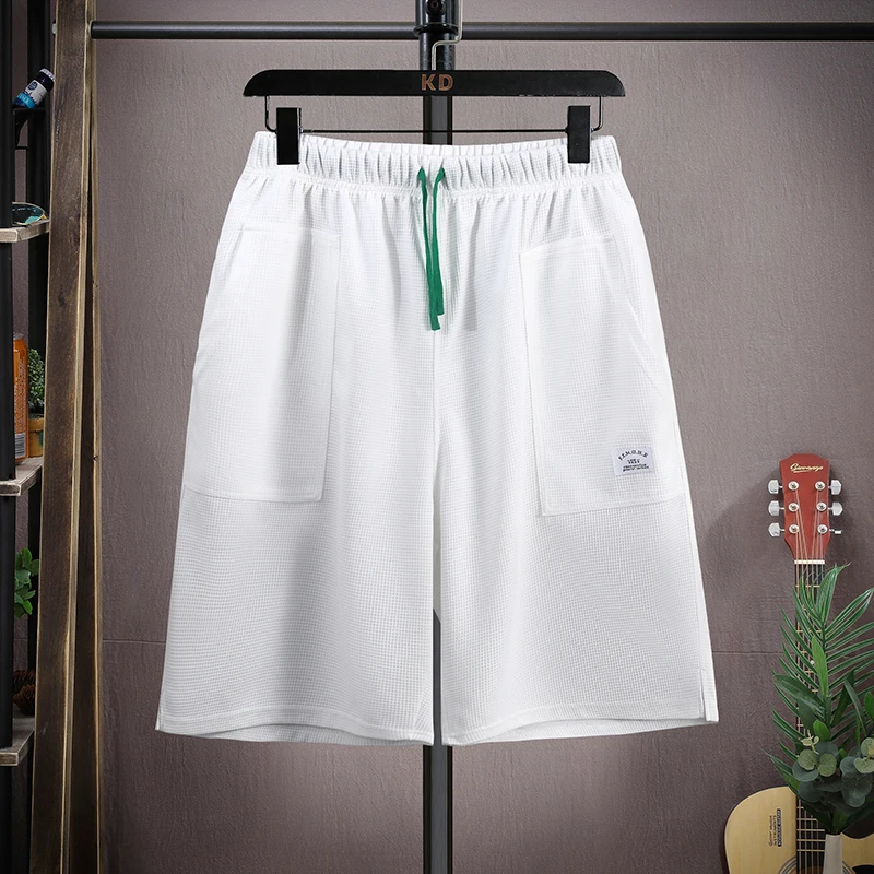 

Summer Ice Silk Loose Men's Spor Casual orts Trendy Wfle Patterned Five-Quarter Length Hong Kong Sle INS Leisure Pants