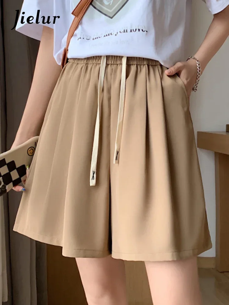 Jielur الصيف الرباط ضئيلة لون نقي السراويل النسائية عالية الخصر طول الركبة عارضة الشارع الشهير جيوب أسود أصفر فاتح السراويل