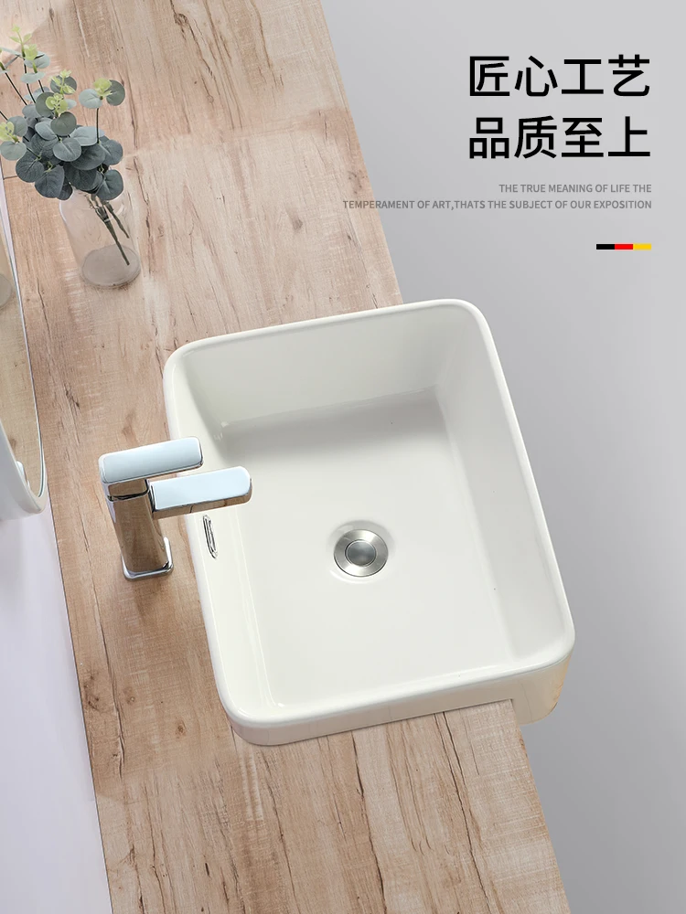 Il centro del lavabo da tavolo, lavabo da tavolo semi-incorporato, bagno di hotel domestici, strumenti per lavabo in ceramica semi-appeso, lavandino