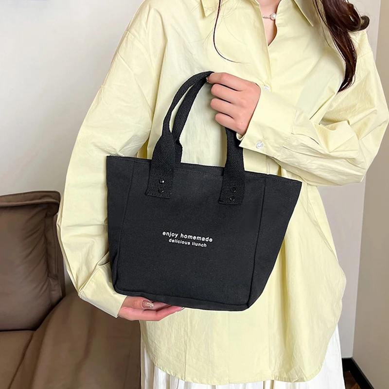 男性と女性のためのニュートラルなスタイルのハンドバッグ、毎日の旅行に最適です。 ナイロン素材で作られています。 ギフトとして贈ることができます。