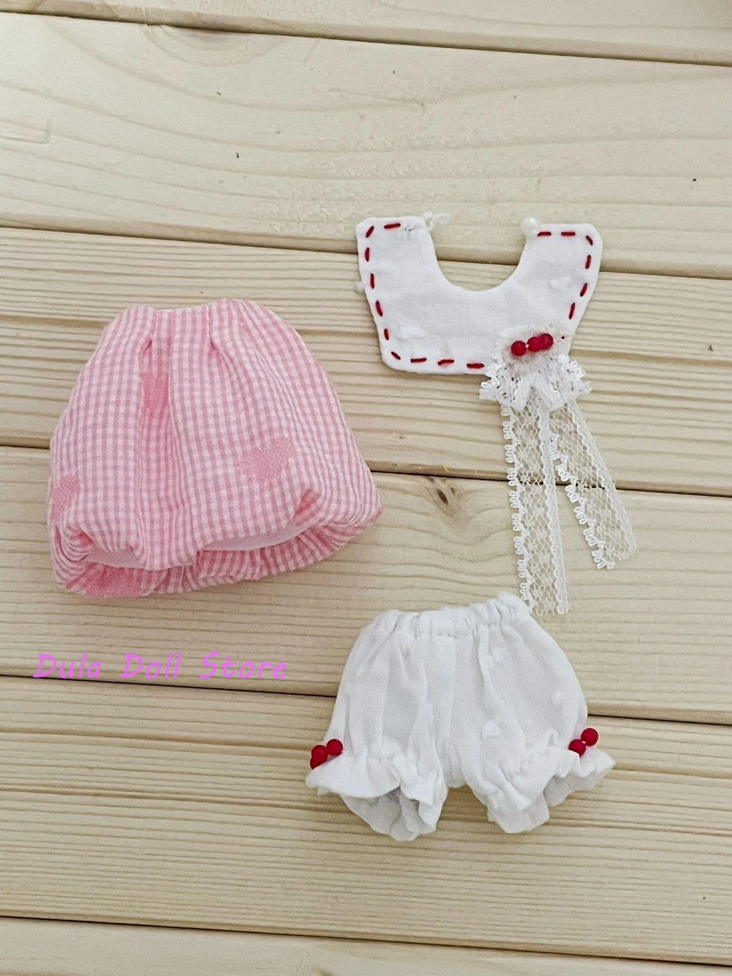 

Комплект одежды для куклы Dula 2026: розовый клетчатый топ без рукавов с рукавами-фонариками и шорты для куклы Diandian, для куклы с телосложением 6-ти размера.