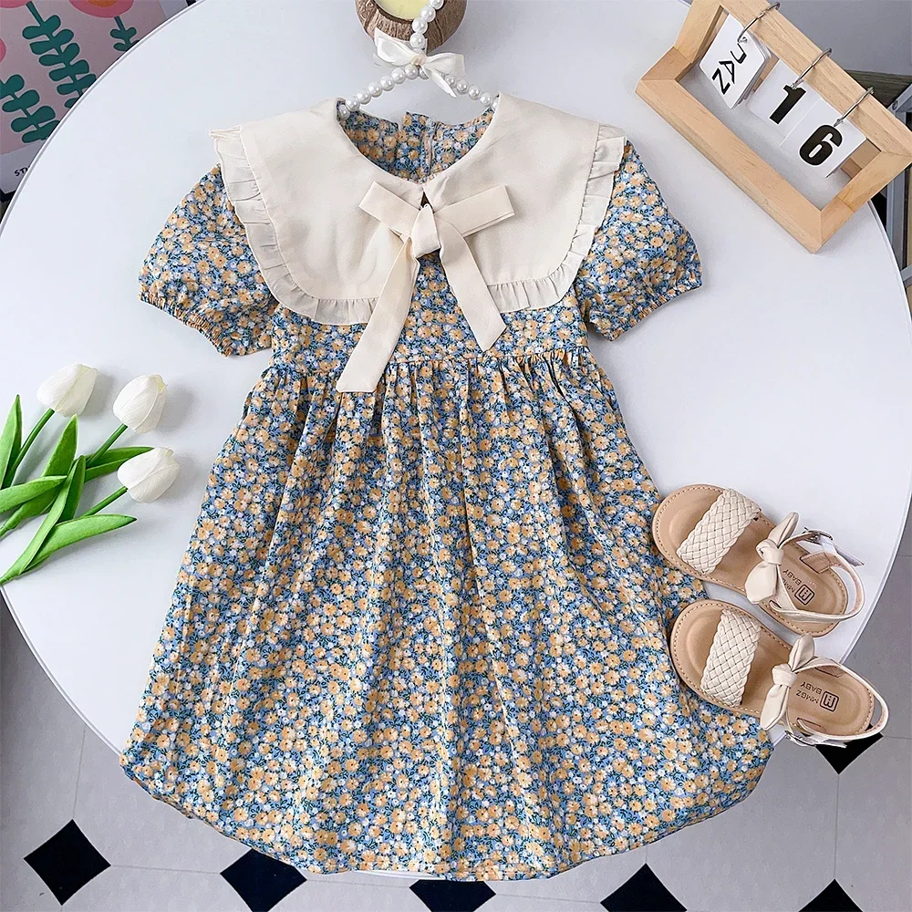 Leisure Countryside Style Girls' Clothes Lapel Bow Bubble Sleeve Princess Dress Floral Summer New Style for Children Aged 2-7
