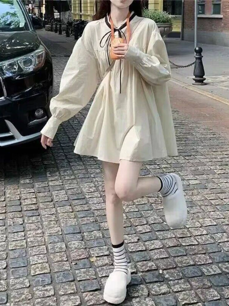 Abito francese vintage con maniche a palloncino Girly rilassato girocollo con fiocco e abito a trapezio smock Gonna silhouette mini bambola tono tè alla moda