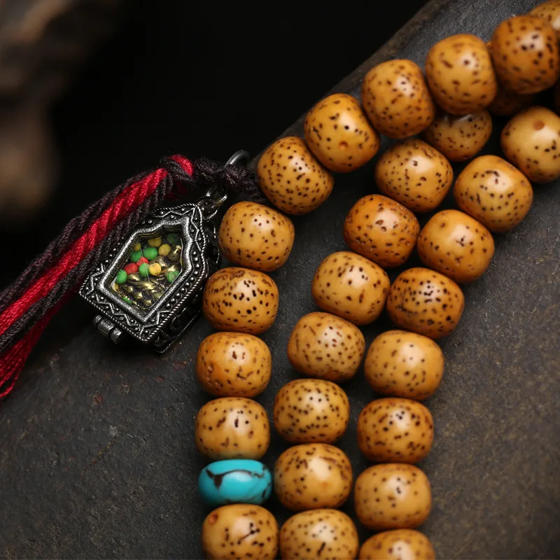 108-bead Tibetan-style Star Moon Bodhi seed prayer beads with antique material and a small four-sided Thangka amulet