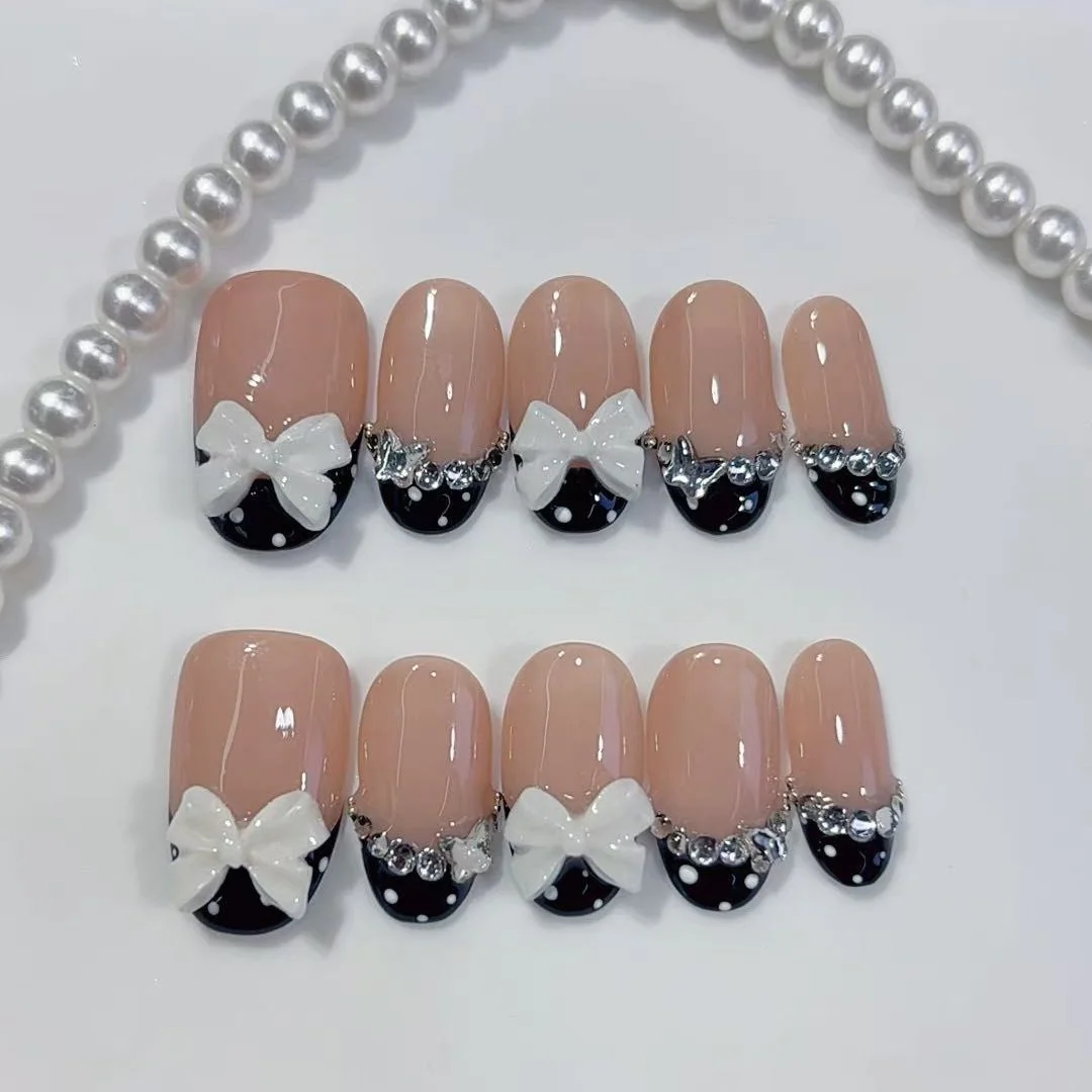 10pcs high-end Simple yet luxurious style, featuring a three-dimensional bowknot and dazzling stacked diamond handmade fake nail