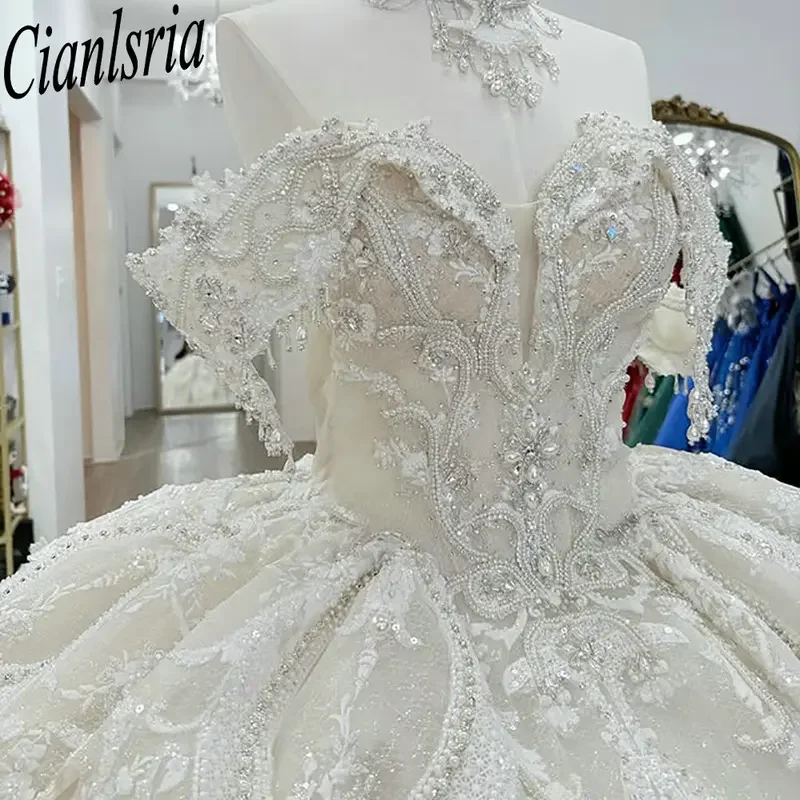 

Ivory Beading Crystal Ruffles Quinceanera Dresses Ball Gown Off The Shoulder Appliques Lace Sweet 15 Años Mexican Customized