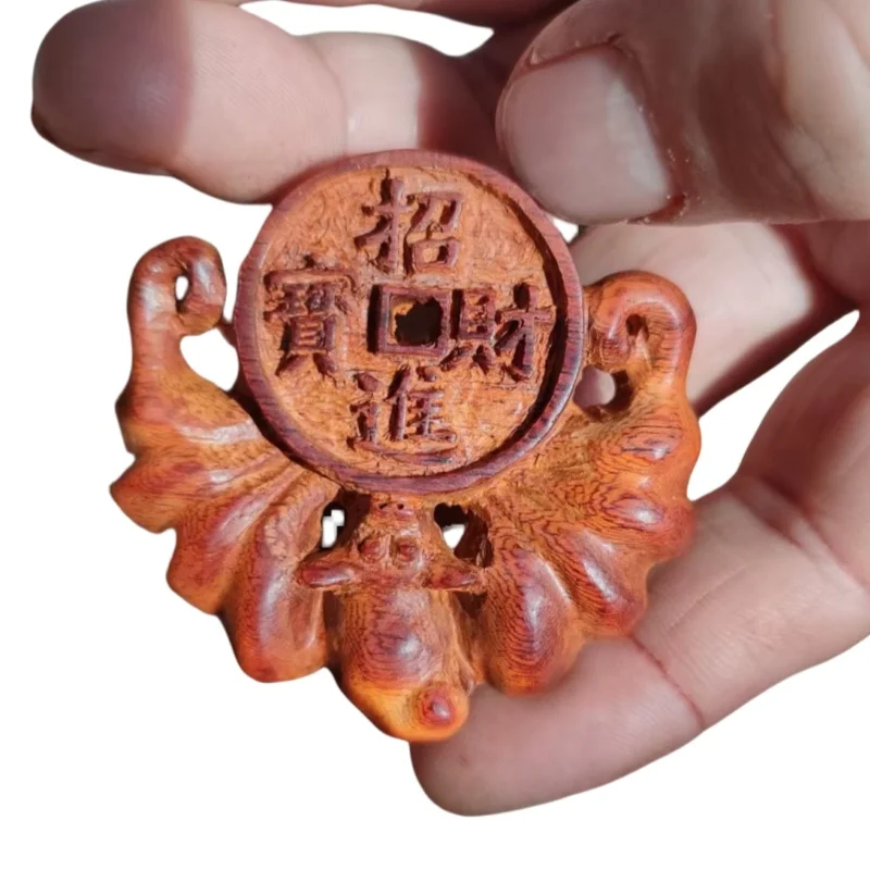 

Traditional folk hand carved handle pieces symbolize wealth and prosperity