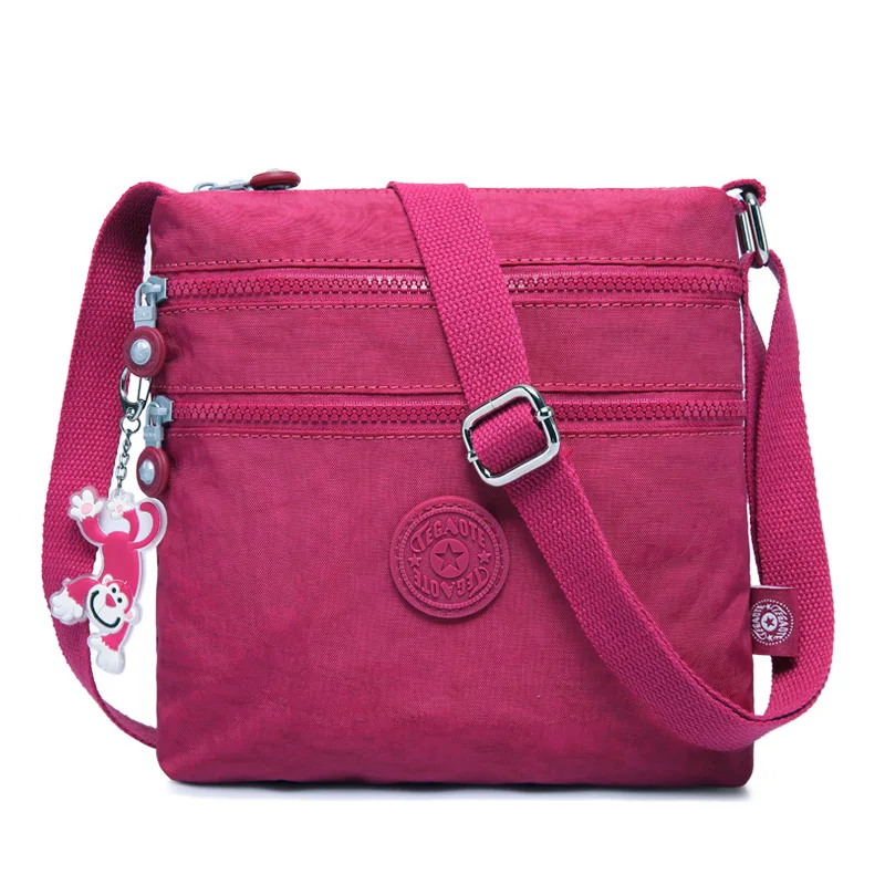 Bolso de hombro cruzado para hombre y mujer, bandolera pequeña ligera de alta calidad, Color Azul, Gris, negro, rojo y morado, novedad de verano, M0910