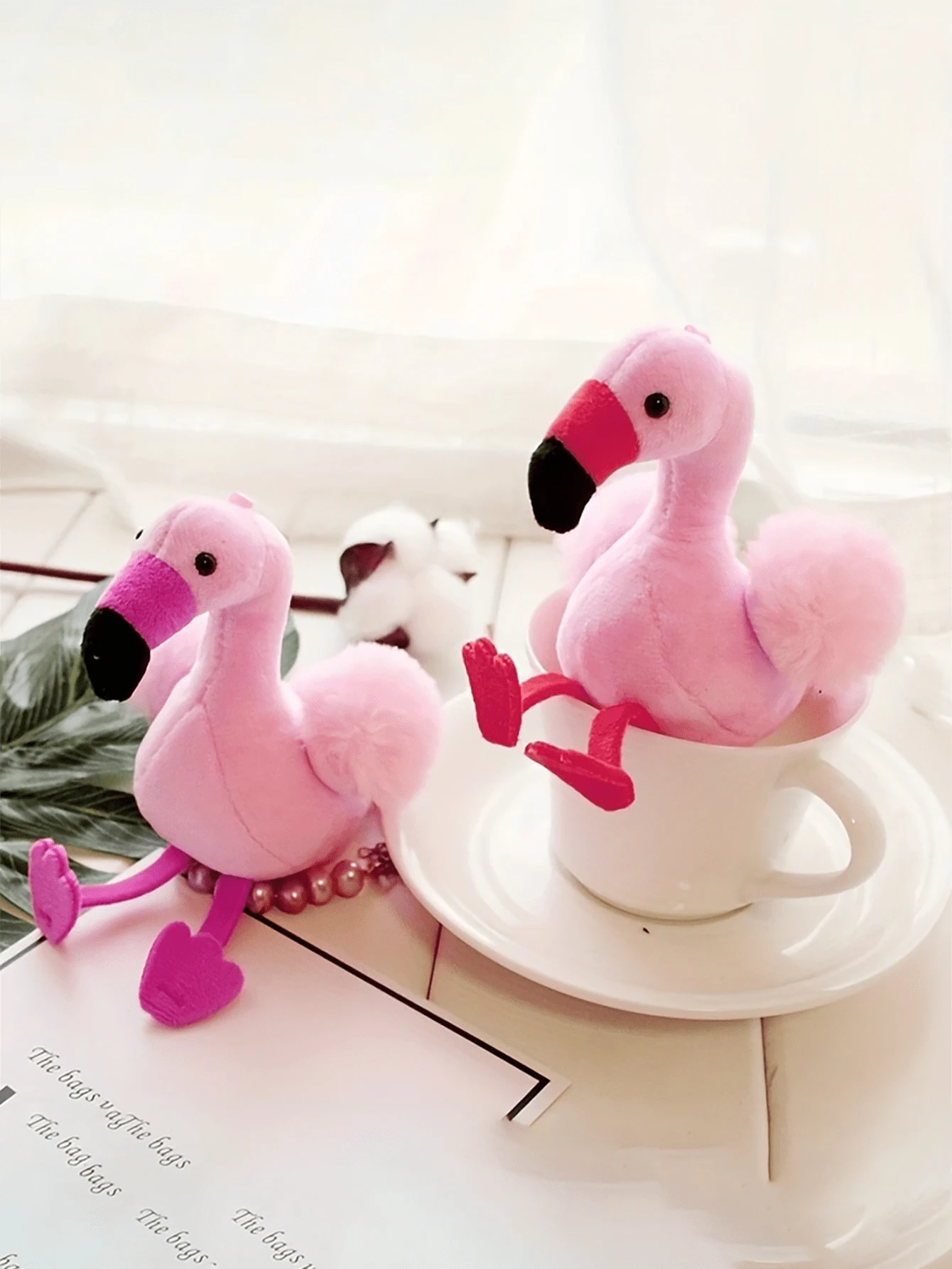 A mini flamingo plush toy suitable for pet companionship and play, not suitable for pets to chew and bite