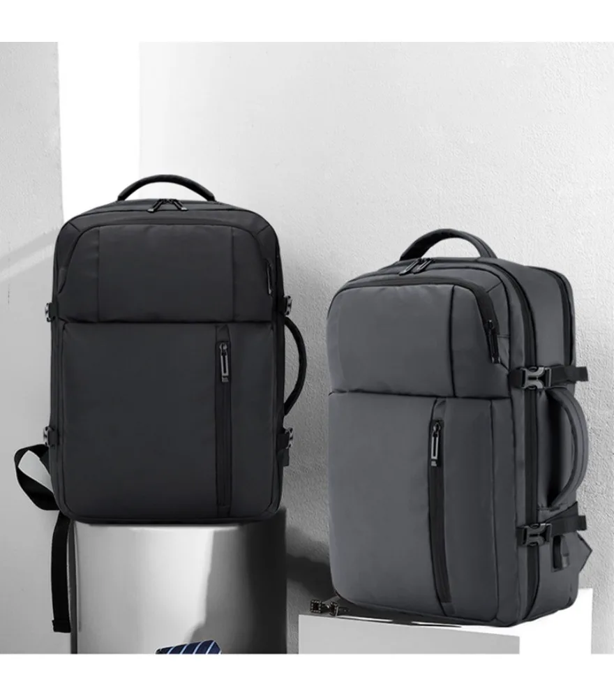 Dark gray expandable laptop backpack with side adjustable buckles anti splash compact tailored shape for business commute