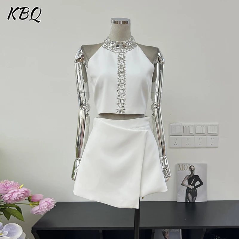 KBQ Solid Spliced Diamonds Two Piece Set For Women O Neck Sleeveless Short Top High Waist Mini Skirt Slimming Sets Female New