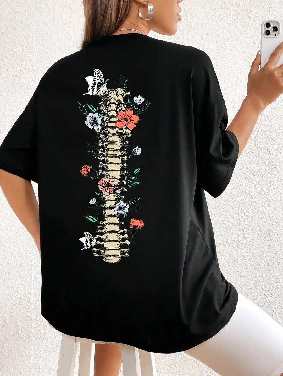 

Plus - Size Trendy “Spine & Flowers” Graphic Tee, Black Short - Sleeve with Dark Aesthetic