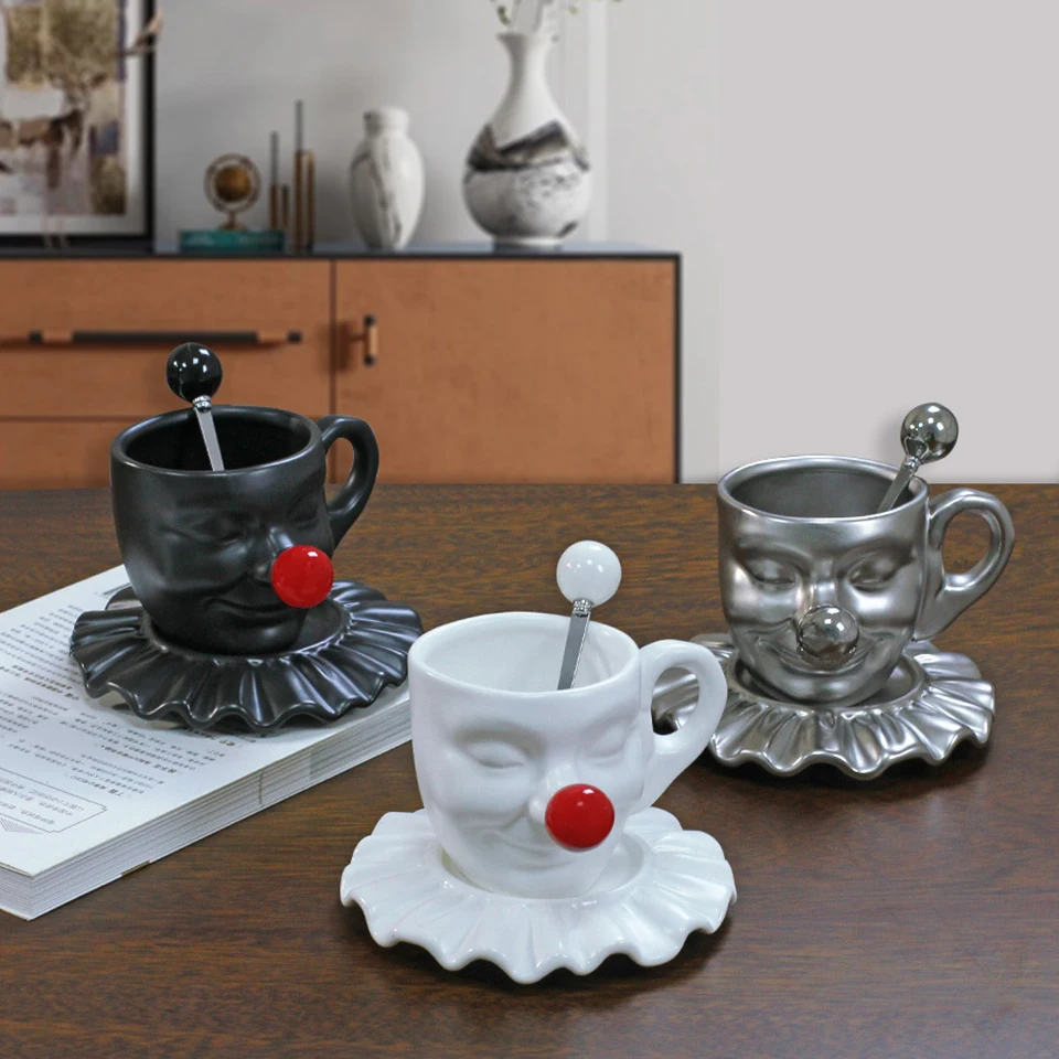 

Creative Joker Mug and Dish Set, Clown Face Art Ceramic Coffee Cup & Saucer Set with Spoon, Black & White Available, Unique Gift