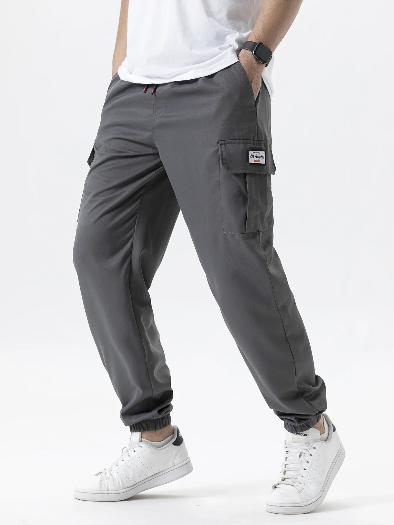 الرجال عارضة البضائع Sweatpants الربيع/الخريف S-2XL الخصر الرباط ركض المشي لمسافات طويلة السراويل التكتيكية للرجال مع جيوب