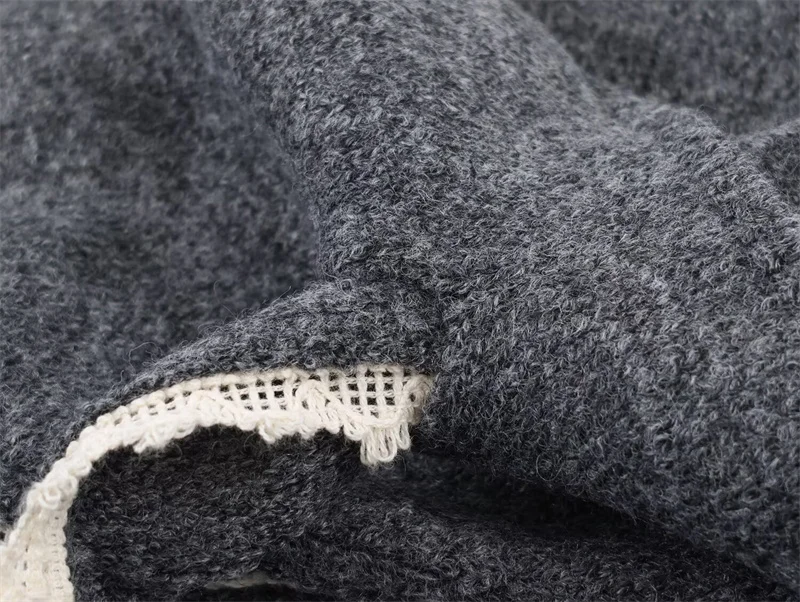 Nieuwe herfst en winter dames eenvoudige lange sjaalkraag kanten rand gebreide trui mode casual dames gebreide top