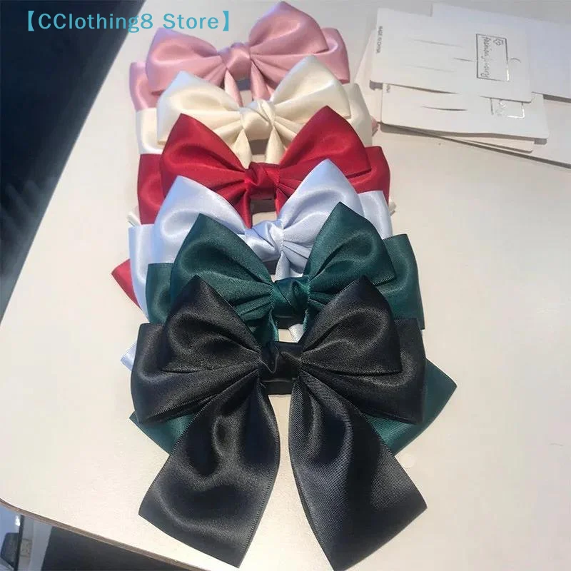 กิ๊บติดผมริบบิ้นโบว์สีพื้นแบบใ - Ribbon Bow Gift บทวิจารณ์และราคา