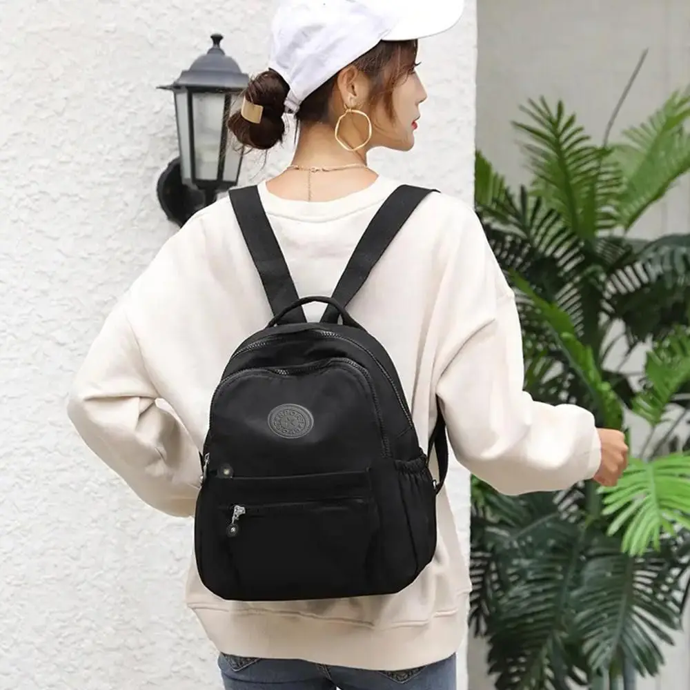 Bolso de hombro de viaje versátil para mujer, Mini Mochila pequeña de gran capacidad