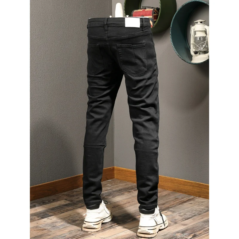 Celana jeans hitam pria musim gugur 2025, tren pakaian pria terbaru, merek ternama, elastis, warna solid, simpel dan serbaguna, potongan slim fit, celana kaki kecil