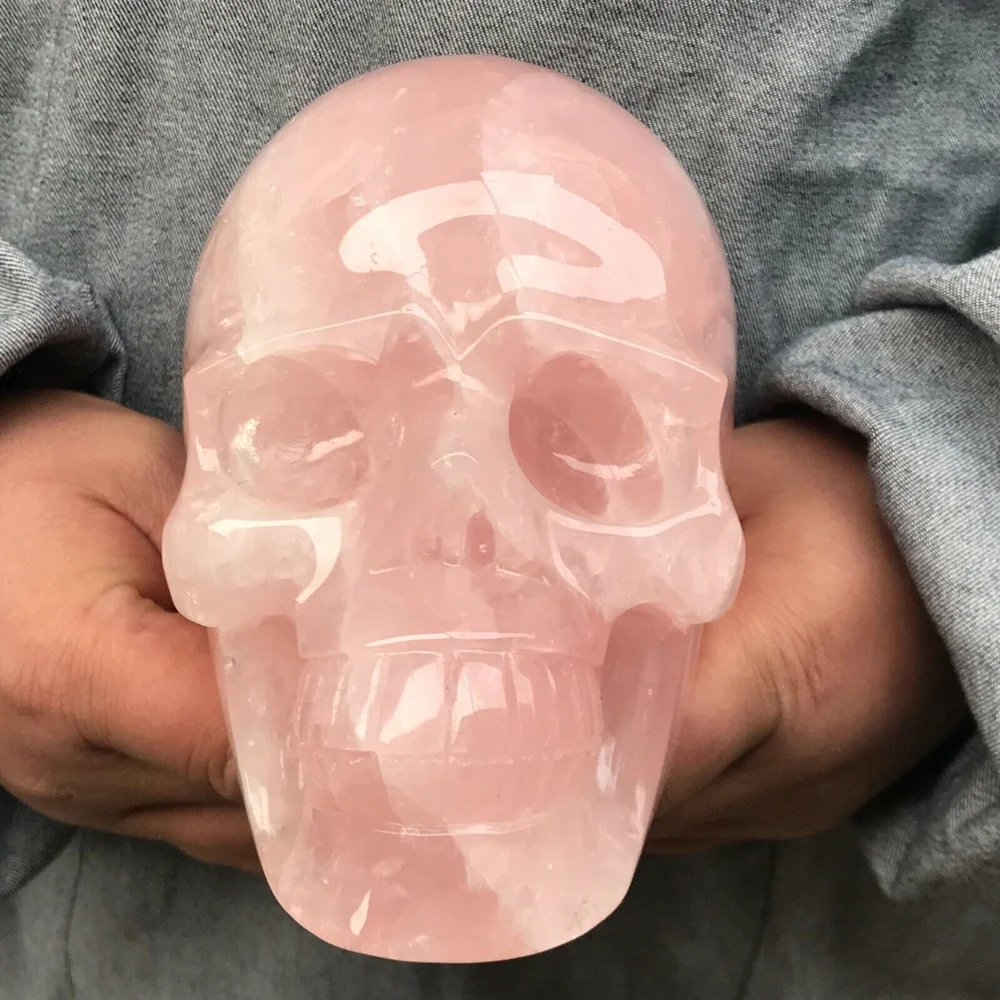 

Natural Rose Quartz Crystal Skull Is Hand-Carved And Polished For Energy Meditation Decorating Gifts