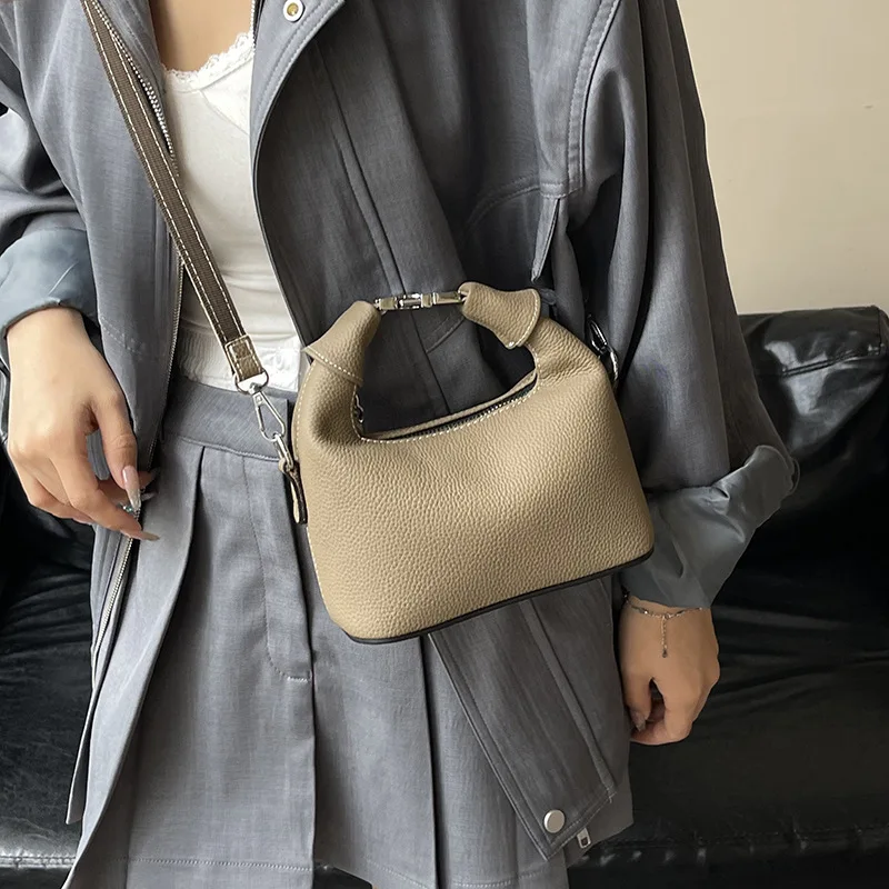 

New Leather Lunch Box Bag Women's Niche High-end Sense Portable Messenger Dumpling Mobile Phone Bag