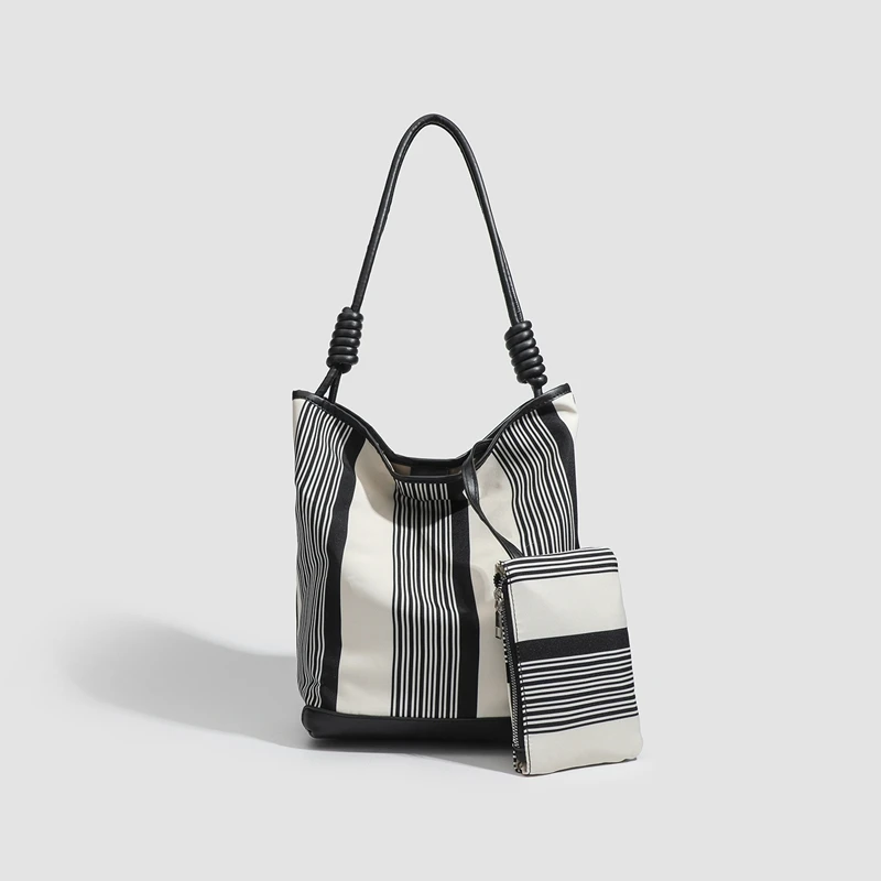 

2025 Spring New Contrast Color Stripe Pu Shoulder Strap Handbag Women's Large Capacity Commuter Luxury Underarm Shoulder Bag