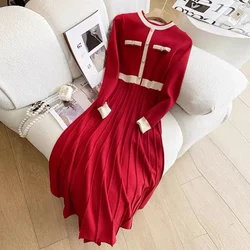 2026 New Autumn Winter O-neck long sleeved knitted Dress Pockets single breasted high waisted A-line long sweater Dress