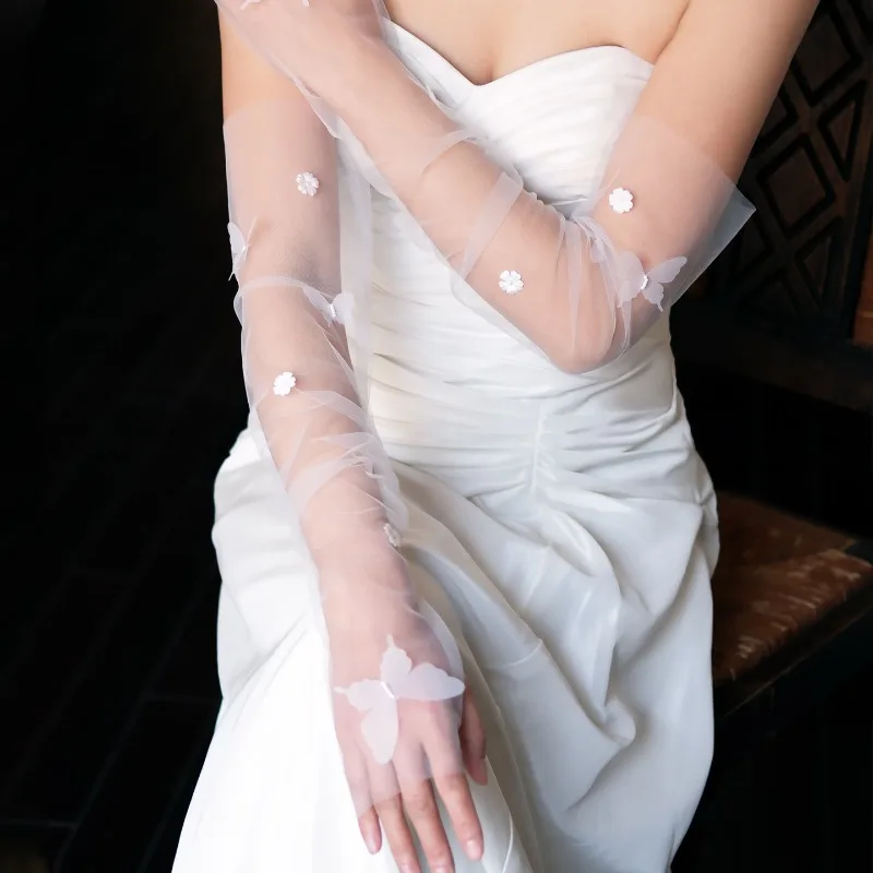 

Длинные тюлевые рукава с бантом, элегантные белые руки, закрывающие перчатки без пальцев, аксессуары для свадебного платья, оптовая продажа