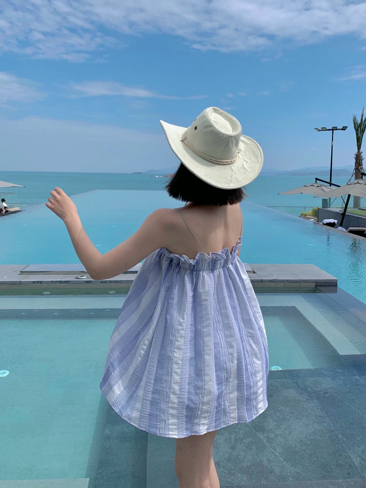 Haikou Sanya vêtements de voyage vêtements d'extérieur pour femmes haut court à bretelles conception amincissante Sensation plage Vaion Anti-âge