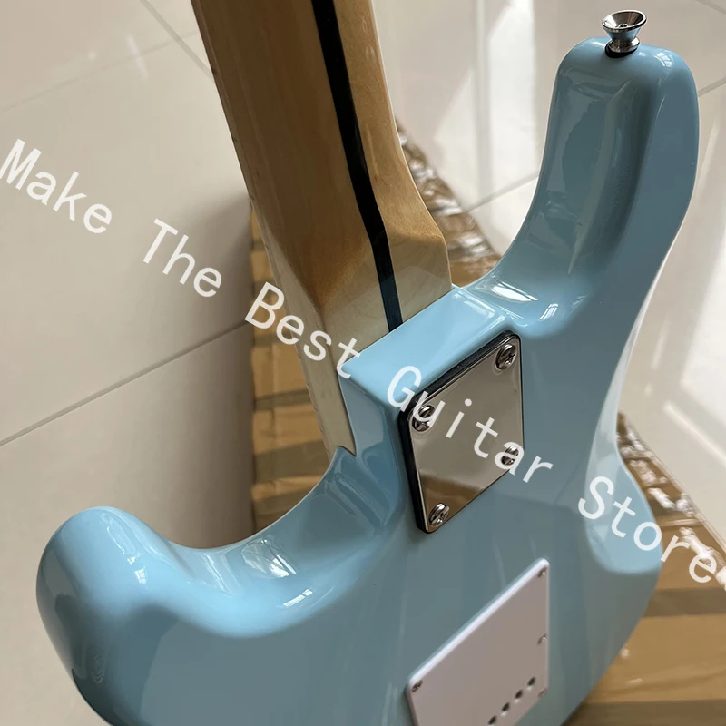 Exquisite bright blue electric guitar, tremolo bridge, professional level, fast delivery.