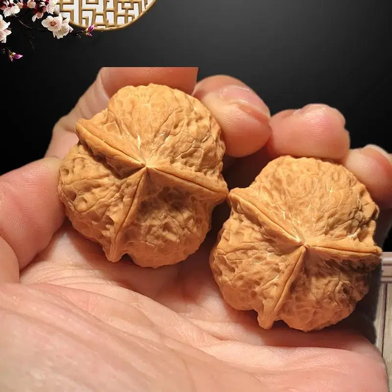 Wild-grown iron walnuts from old trees featuring a -pronged lion's head design with three ridges hand-painted quick to p