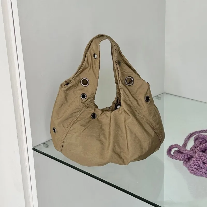 

Повседневные сумки в форме полумесяца для женщин, нейлоновая стеганая сумка на плечо, НОВАЯ сумка-тоут с полыми шипами, женские легкие кошельки