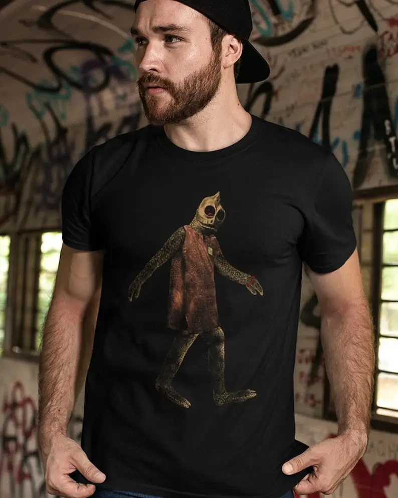 

Land of The Lost Enik Sleestak Tee