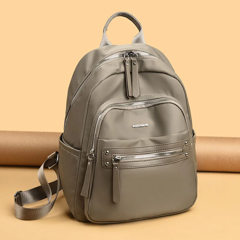 Large capacity retro style waterproof cloth women's backpacks, convertible shoulder bag, perfect for commuting and travel pack