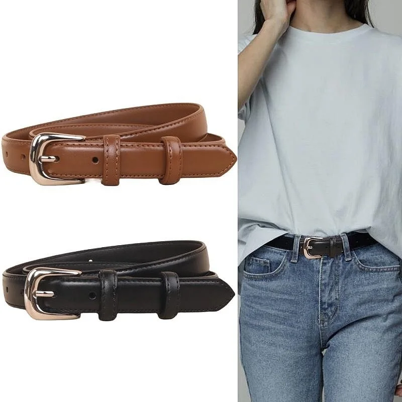 

Ремень из натуральной кожи с серебряной пряжкой в сочетании с джинсами. Женские простые украшения. Дизайн. Нишевые тонкие ремни.