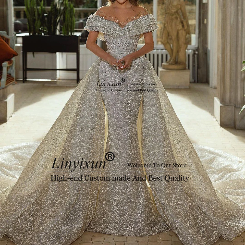 

Luxury Crystal Wedding Dresses 2025 Off Shoulder Detachable Train Mermaid Bridal Gown Customized Sleeveless فساتين حفل